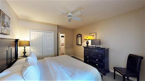 104 K - 100 Bighorn Boulevard, Radium Hot Springs, BC - Indoor Photo Showing Bedroom