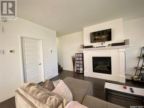 B 422 St Mary Street, Esterhazy, SK - Indoor Photo Showing Living Room With Fireplace
