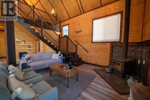 6392 Osprey  View Landing, Wardner, BC - Indoor Photo Showing Living Room With Fireplace