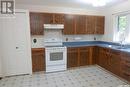 507 4Th Avenue W, Assiniboia, SK  - Indoor Photo Showing Kitchen With Double Sink 