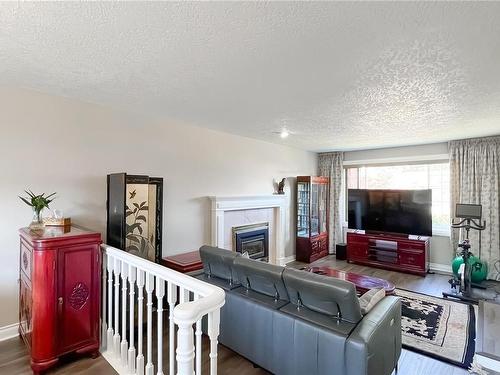 1016 Adeline Pl, Saanich, BC - Indoor Photo Showing Living Room With Fireplace