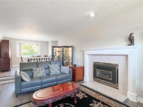 1016 Adeline Pl, Saanich, BC - Indoor Photo Showing Living Room With Fireplace