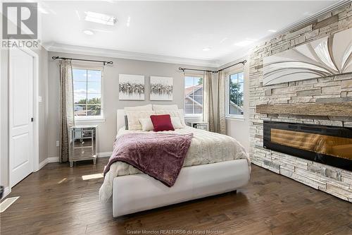 2683 Acadie Rd, Cap Pele, NB - Indoor Photo Showing Bedroom With Fireplace