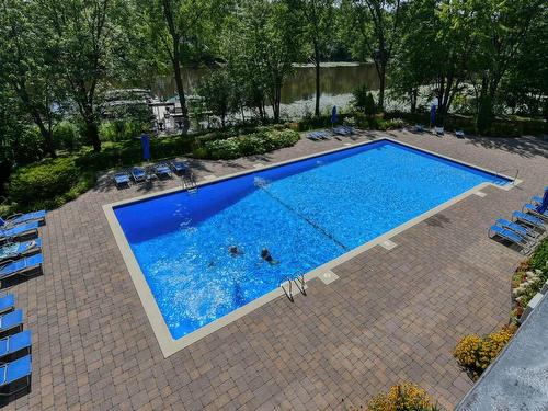 Autre - 108-4300 Place Des Cageux, Laval (Chomedey), QC - Outdoor With In Ground Pool With Backyard