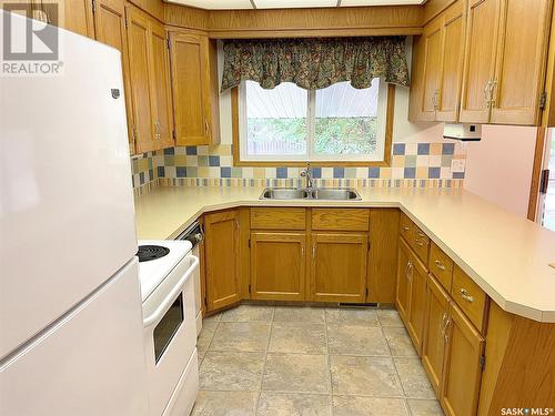 406 1St Street E, Lafleche, SK - Indoor Photo Showing Kitchen With Double Sink