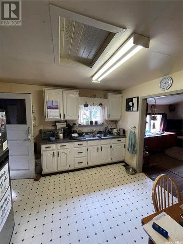 202 3Rd Avenue, Young, SK - Indoor Photo Showing Kitchen With Double Sink