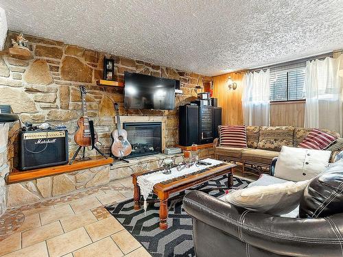 Sous-sol - 918  - 920 Boul. Vanier, Laval (Saint-Vincent-De-Paul), QC - Indoor Photo Showing Living Room With Fireplace