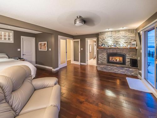 835 Island Hwy South, Campbell River, BC - Indoor Photo Showing Living Room With Fireplace