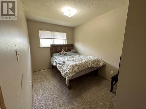 A 8116 90 Avenue, Fort St. John, BC - Indoor Photo Showing Bedroom