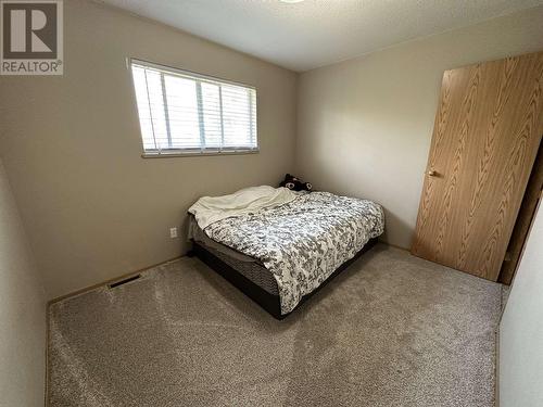 A 8116 90 Avenue, Fort St. John, BC - Indoor Photo Showing Bedroom