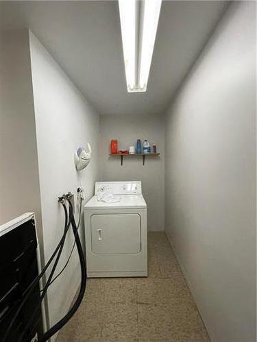 416 10Th Avenue N, Swan River, MB - Indoor Photo Showing Laundry Room
