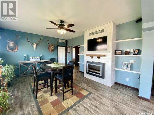 714 5Th Avenue, Alameda, SK - Indoor Photo Showing Dining Room With Fireplace