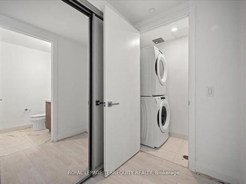 1406-33 Frederick Todd Way, Toronto, ON - Indoor Photo Showing Laundry Room