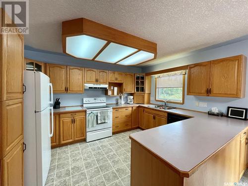 604 Donald Street, Hudson Bay, SK - Indoor Photo Showing Kitchen With Double Sink