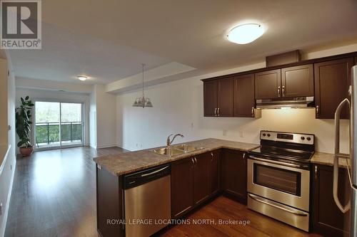 #312 -1 Chamberlain Cres, Collingwood, ON - Indoor Photo Showing Kitchen With Double Sink