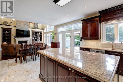 23 Cranborne Chase, Whitchurch-Stouffville, ON - Indoor Photo Showing Kitchen With Fireplace