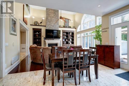 23 Cranborne Chase, Whitchurch-Stouffville, ON - Indoor Photo Showing Dining Room With Fireplace