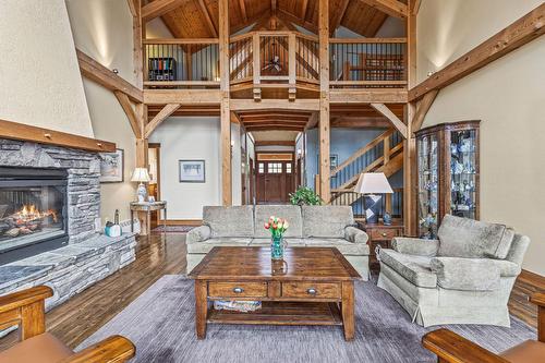 1403 Deer Ridge Road, Golden, BC - Indoor Photo Showing Living Room With Fireplace