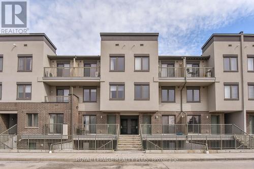 #27 -350 Fisher Mills Rd, Cambridge, ON - Outdoor With Balcony With Facade