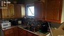 812 Elsinore Street, Whitewood, SK  - Indoor Photo Showing Kitchen With Double Sink 