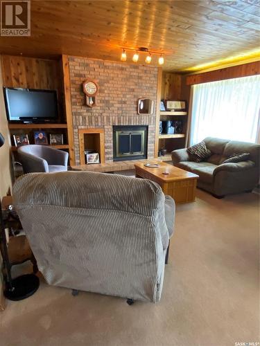537 1St Street, Estevan, SK - Indoor Photo Showing Living Room With Fireplace