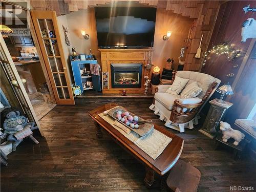 696 Victoria Street, Edmundston, NB - Indoor Photo Showing Living Room With Fireplace
