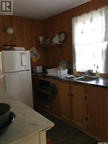 301 Evenson Avenue, Manitou Beach, SK - Indoor Photo Showing Kitchen With Double Sink