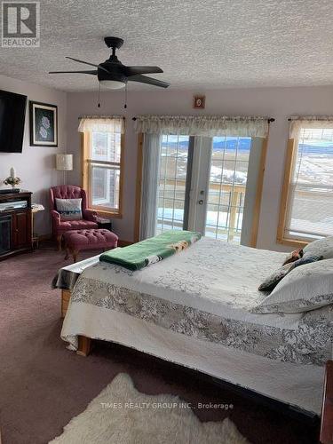 22037 Range Road 280, Mountain View, AB - Indoor Photo Showing Bedroom