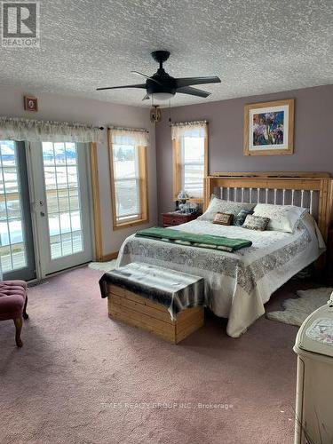 22037 Range Road 280, Mountain View, AB - Indoor Photo Showing Bedroom