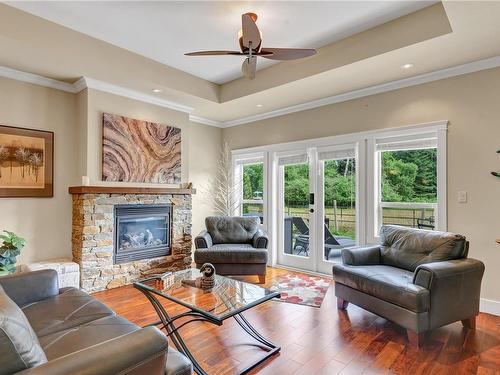 5-48 Mcphedran Rd South, Campbell River, BC - Indoor Photo Showing Living Room With Fireplace