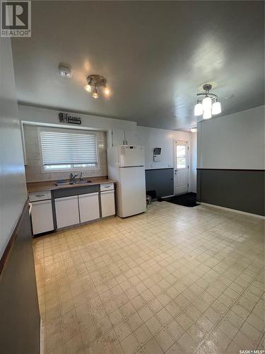 708 Birch Crescent, Hudson Bay, SK - Indoor Photo Showing Kitchen With Double Sink