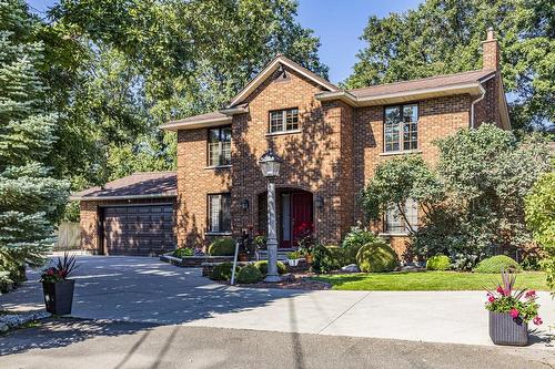 Stately brick two storey situated on over ½ acre of manicured grounds sloping toward waterfront - 23 Winona Park Road, Stoney Creek, ON - Outdoor