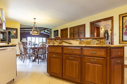 The Barzotti cherrywood kitchen enjoys loads of counter and cupboard space including a large pantry area - 23 Winona Park Road, Stoney Creek, ON - Indoor