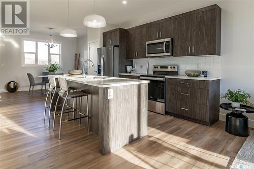 723 Henry Dayday Road, Saskatoon, SK - Indoor Photo Showing Kitchen With Upgraded Kitchen