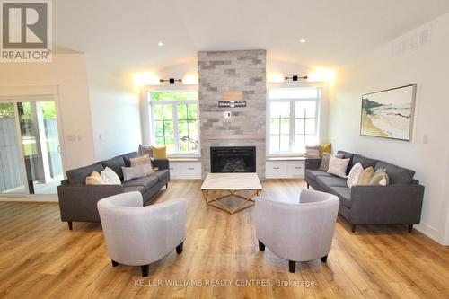 112 Jackson Street E, West Grey, ON - Indoor Photo Showing Living Room With Fireplace