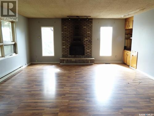 902 J Avenue, Perdue, SK - Indoor Photo Showing Living Room With Fireplace