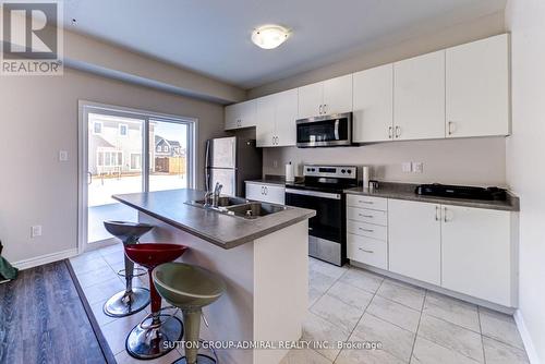 23 Bobolink Drive, Wasaga Beach, ON - Indoor Photo Showing Kitchen With Double Sink