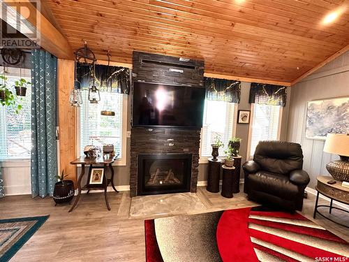 Lot 7 Chamakese Resort, Chitek Lake, SK - Indoor Photo Showing Living Room With Fireplace