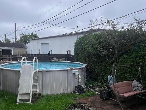 Exterior - 6 Rue St-Émile, Québec (Beauport), QC - Outdoor With Above Ground Pool With Backyard