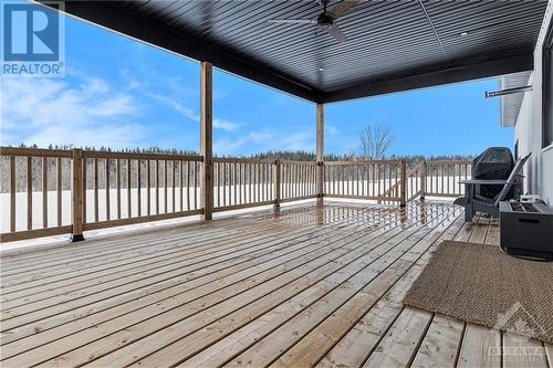 303 sq ft covered deck - *NOT THE HOME FOR SALE - SAME MODEL PREVIOUSLY BUILT BY BUILDER* - 260 Trudeau Crescent, Russell, ON - Outdoor With Deck Patio Veranda With Exterior
