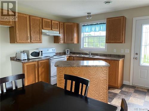 269 Roseberry, Campbellton, NB - Indoor Photo Showing Kitchen With Double Sink