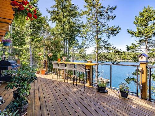 659 Wilks Rd, Mayne Island, BC - Outdoor With Body Of Water With Deck Patio Veranda