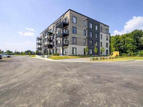 Back facade - 101-4995 Rue Des Ormes, Contrecoeur, QC - Outdoor With Facade