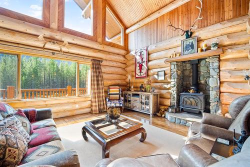 7602 Highway 95, Kingsgate, BC - Indoor Photo Showing Living Room With Fireplace