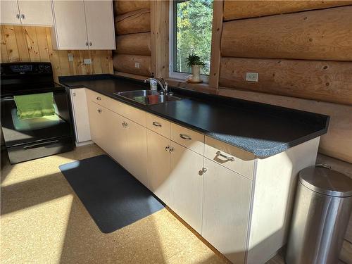 530 Goldeneye Lane, Swan River, MB - Indoor Photo Showing Kitchen With Double Sink