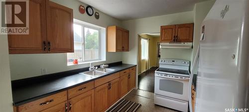 616 1St Street E, Meadow Lake, SK - Indoor Photo Showing Kitchen With Double Sink