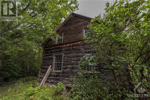 The original log home, built in approximately 1845, is an astounding structure! - 5689 Ferry Road, Ottawa, ON - Outdoor
