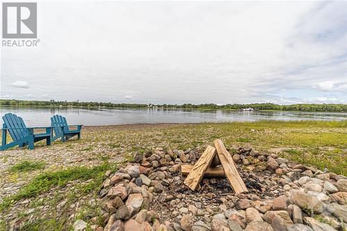 A firepit would be incredible during the evening in Fall! - 5689 Ferry Road, Ottawa, ON - Outdoor With Body Of Water With View
