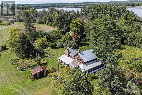 The Farm House, built in ~1910, with 4 bedrooms, 3 porches, and historical features throughout - 5689 Ferry Road, Ottawa, ON - Outdoor With View