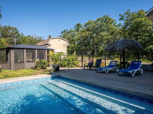 Pool - 195 Rue Vercingétorix, Saint-Calixte, QC - Outdoor With In Ground Pool With Backyard